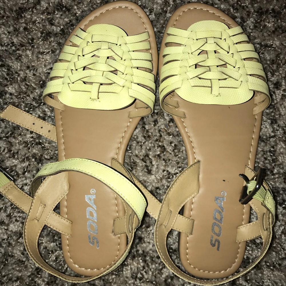 Yellow toned huarache sandals.